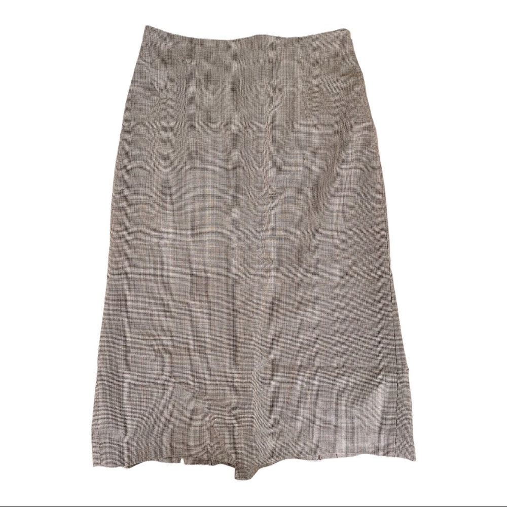 Banana Republic Pencil Skirt. Bl/tan plaid print. Size 6. Good condition.